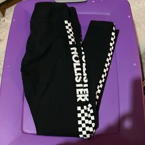 Hollister size small leggings with racing striped downside